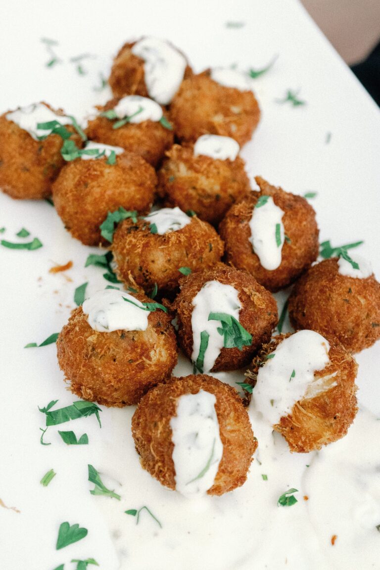 Fried bites with herb crema by 128 South Catering