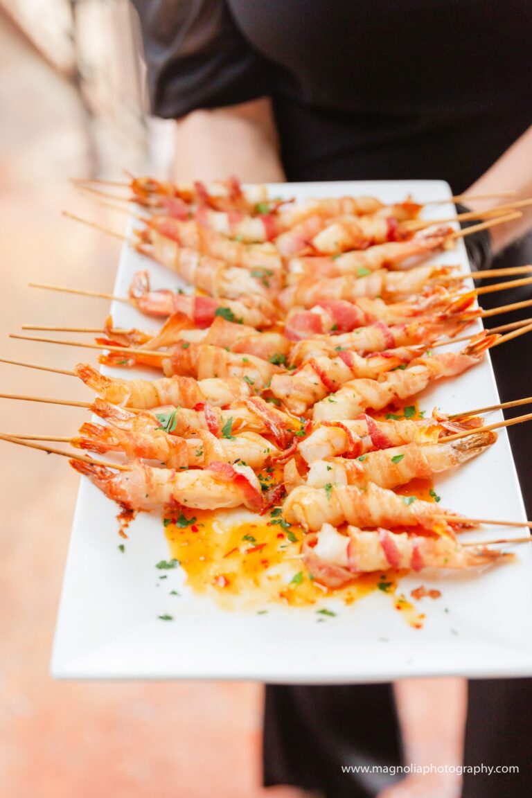 Bacon-wrapped shrimp skewers by 128 South Catering