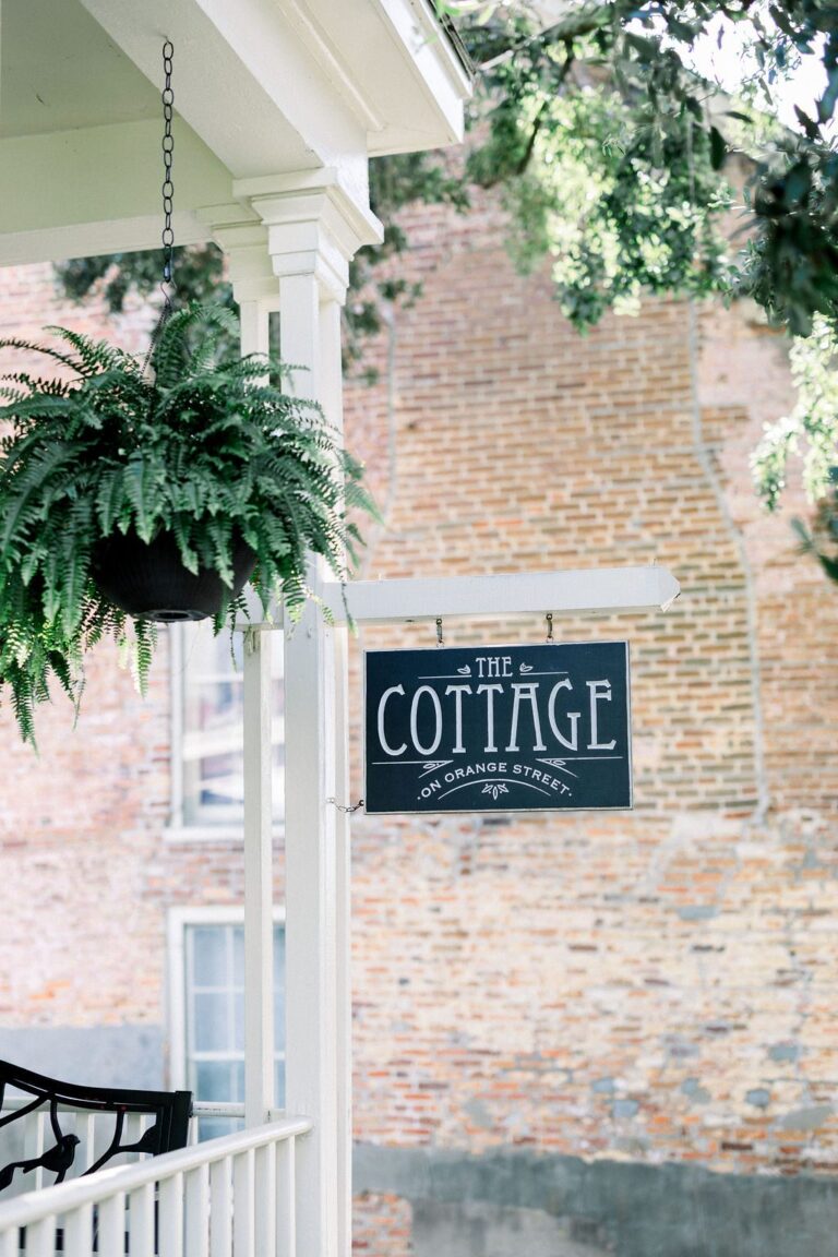 The Cottage sign on the front porch